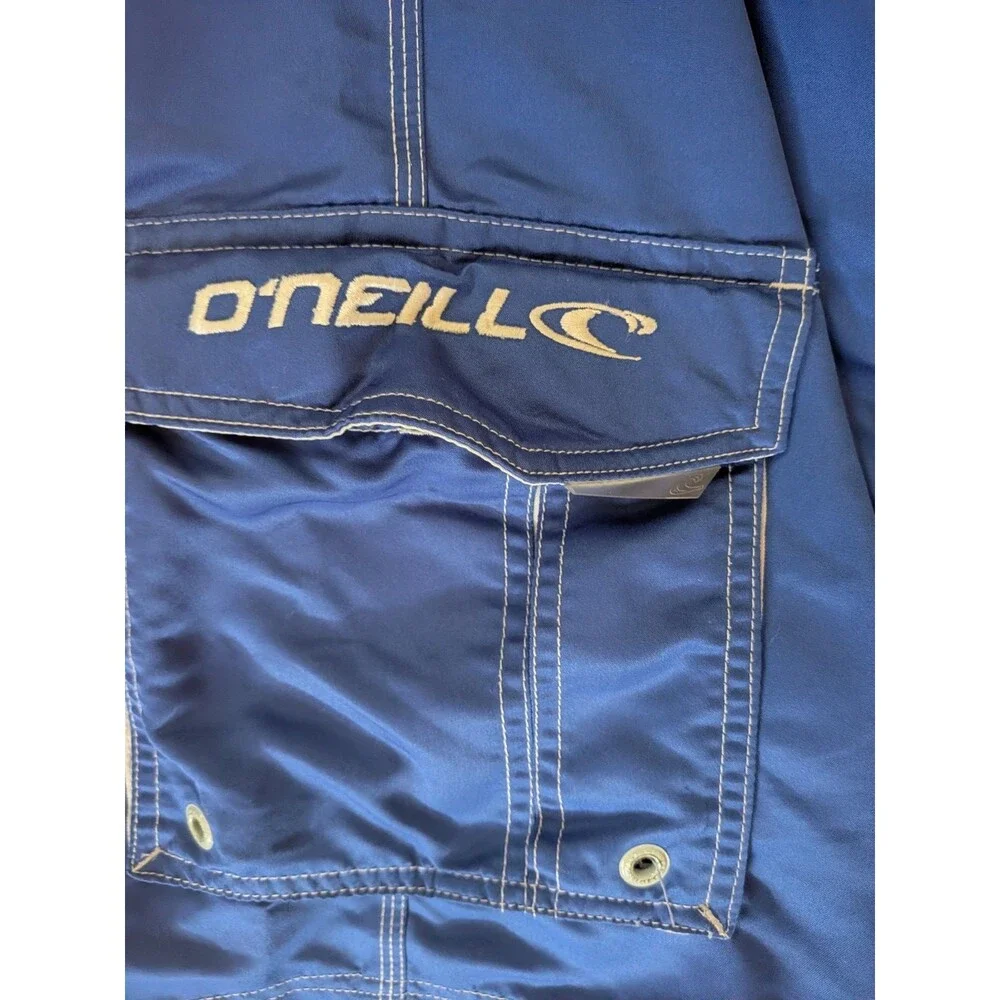 Vintage O'Neill Boardshorts Blue White Cargo Pockets Shiny Surf Wax Comb Size 34